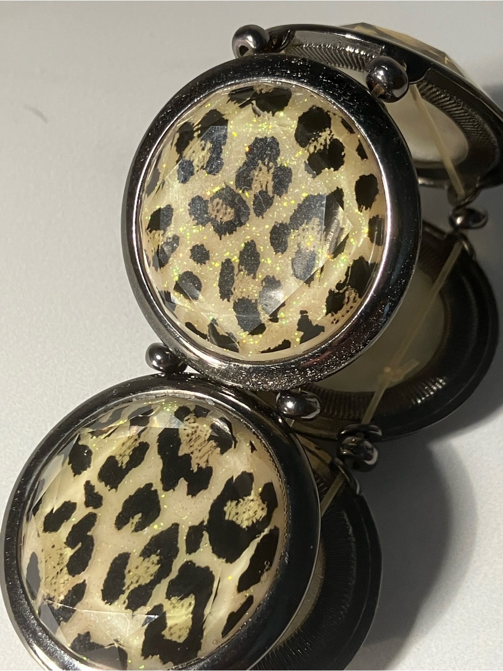 Leopard disc stretch bracelet, hematite bezels with subtle glitter highlighting